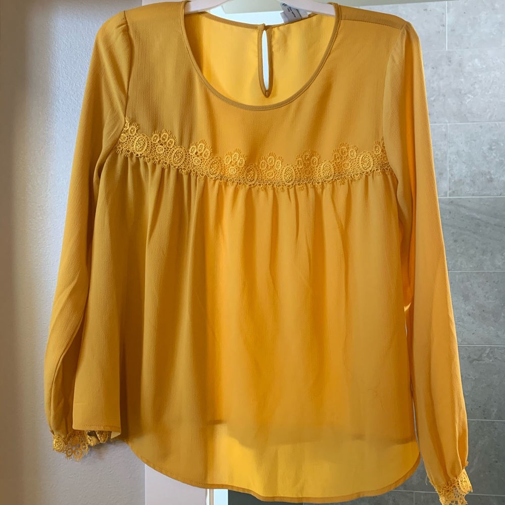 Yellow blouse.